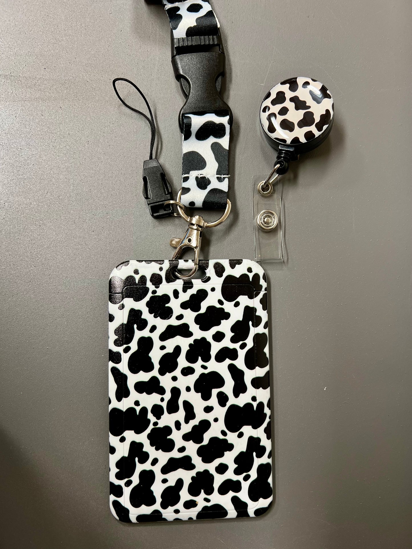 224. Cow Print Badge Reel and Lanyard